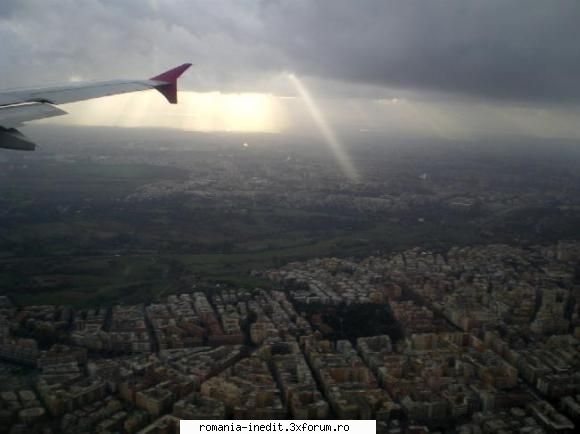 cateva poze din avion roma aterizare vreme ploiasa