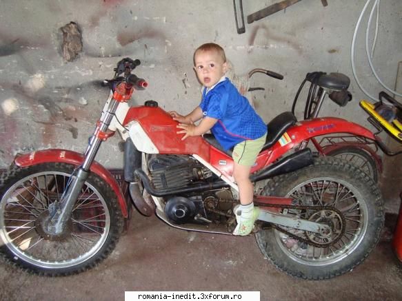 masina atv ai? asta reala mine garaj. motor cross adus din stiu marca nimic nimic. are viteze. cred